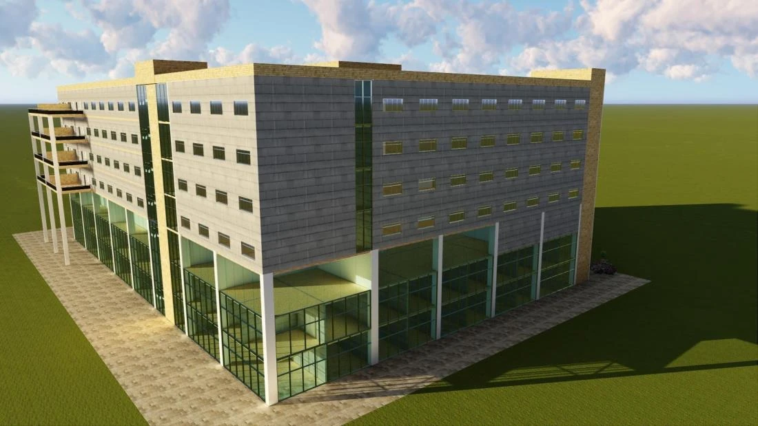 Rendered institutional building with a repeating window grid and a glazed double-height ground floor.