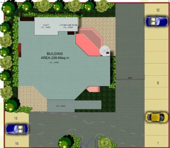 Community centre site plan with the building footprint, parking bays and planting.