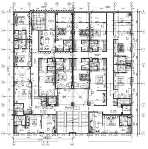 Office building ground floor plan with a gridded structural layout and service cores.