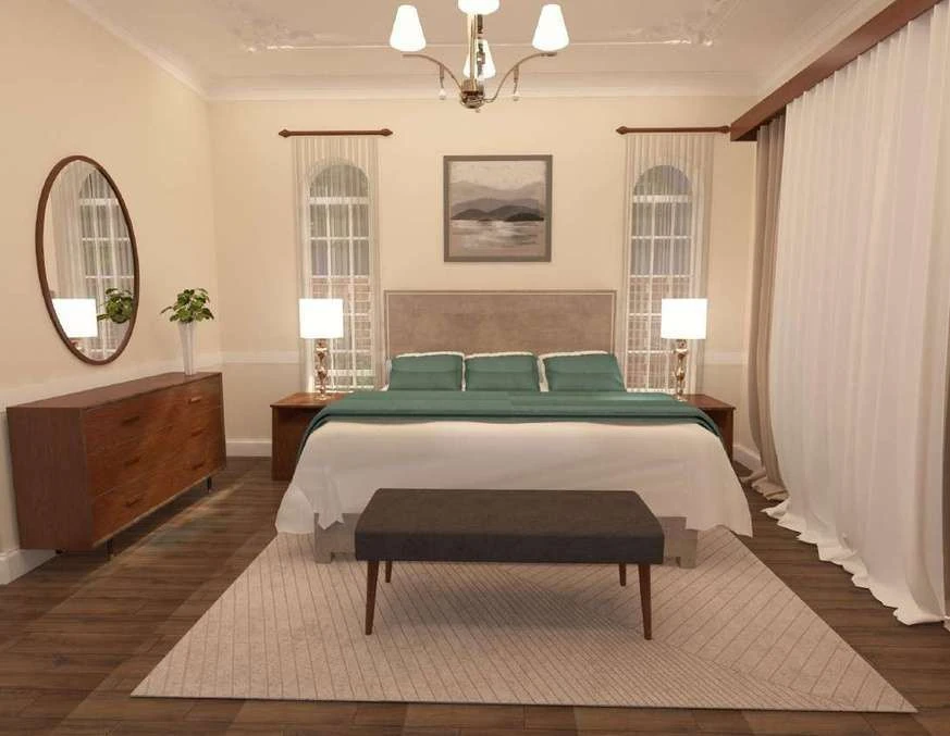 Bedroom with canopy drapes, arched windows, a green upholstered bed and a walnut dresser.