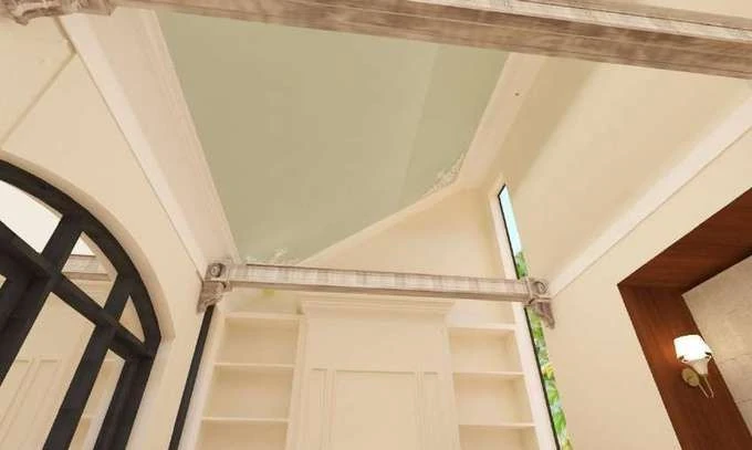 Ceiling elements: exposed wooden log beams under a slant roof with a pale green soffit.