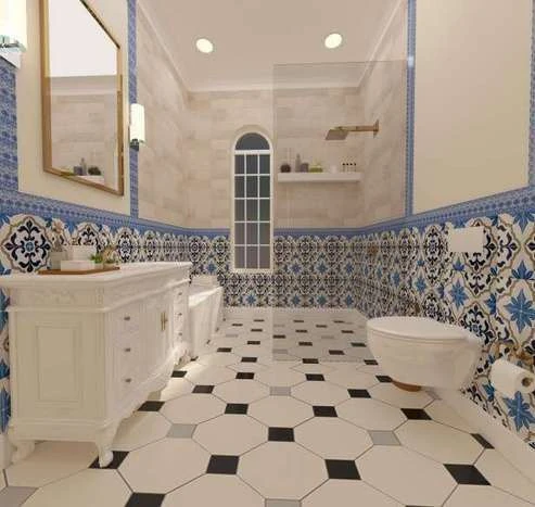 Bathroom with blue and white patterned wall tile, an octagonal black and white marble floor and a freestanding vanity.