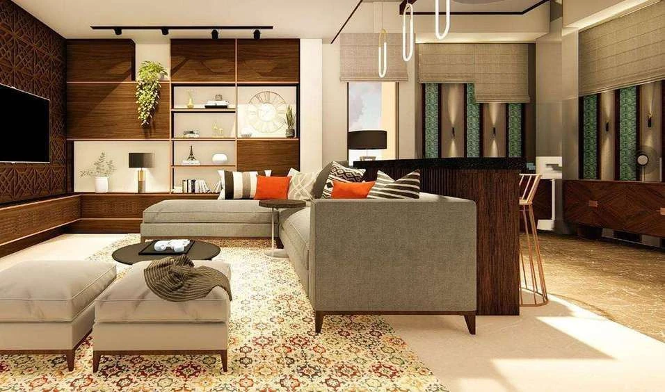 Entertainment room with entertainment unit and buffet, a neutral sofa and coral accent cushions over a patterned rug.
