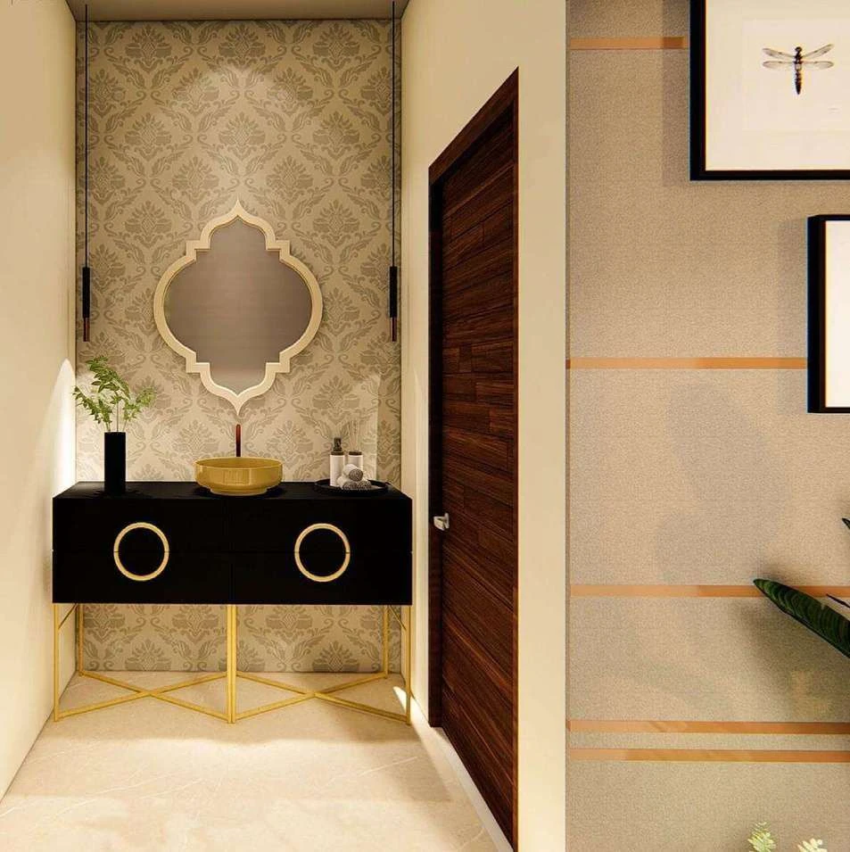 Washing area of the entertainment room with a black console with brass circular pulls beneath a quatrefoil mirror.